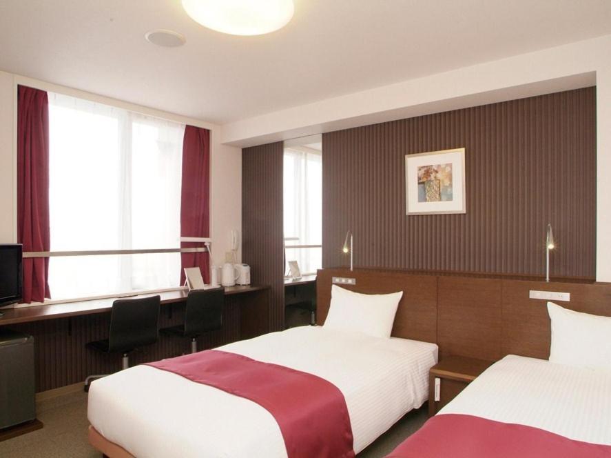 Quad Inn Йокоте Номер фото